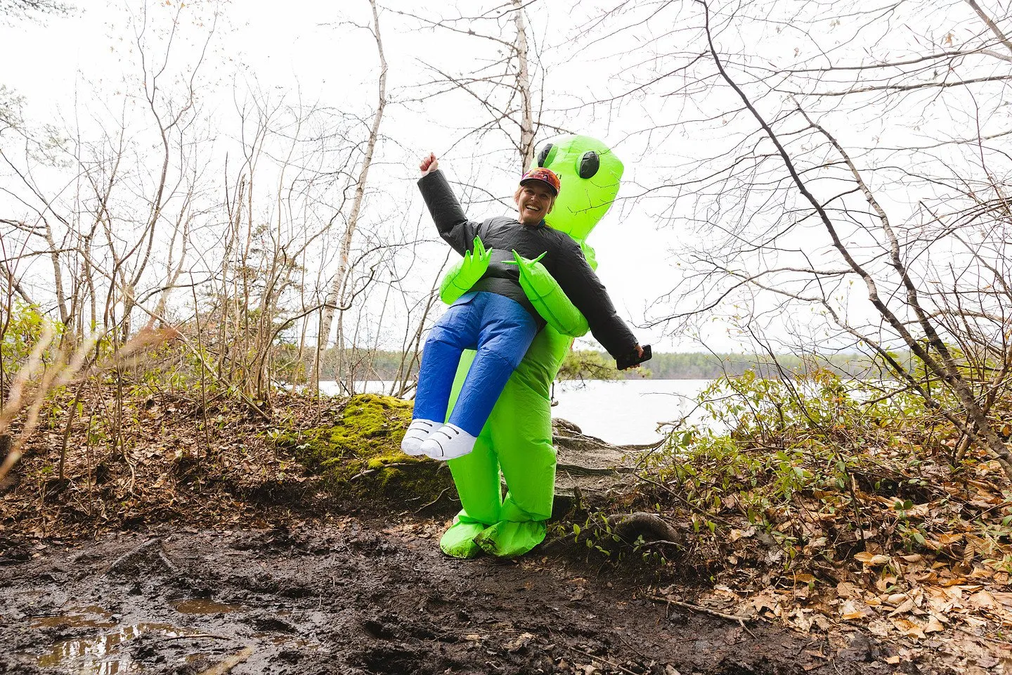 A runner in an inflatable alien costume