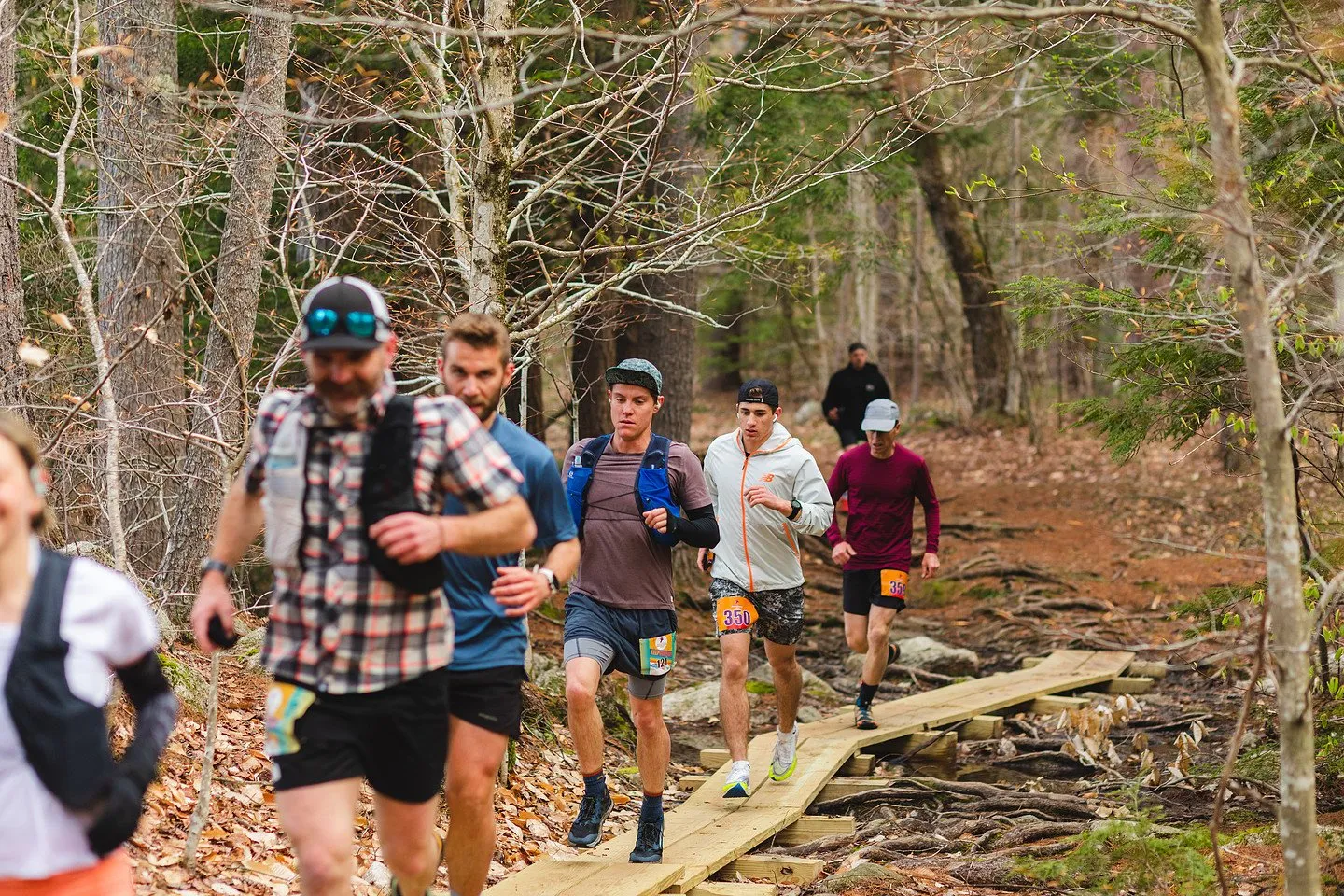 Runners crossing the boardwalk on the loop