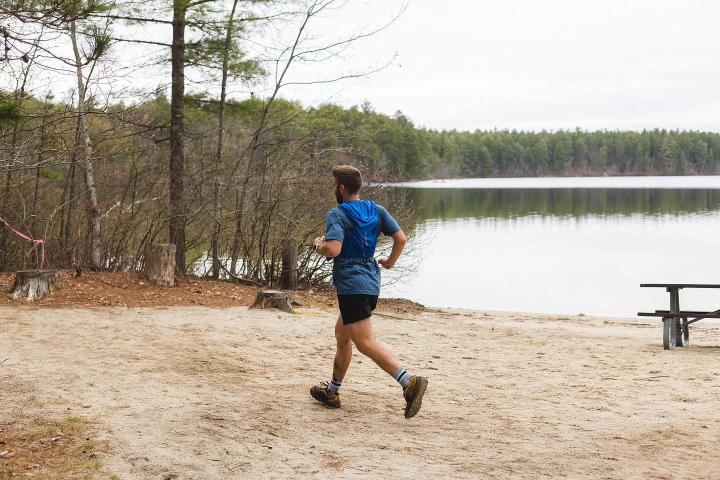 A runner on the lakeshore path