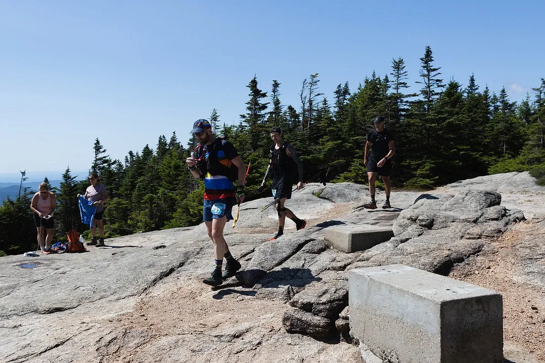 Runners topping out on the summit