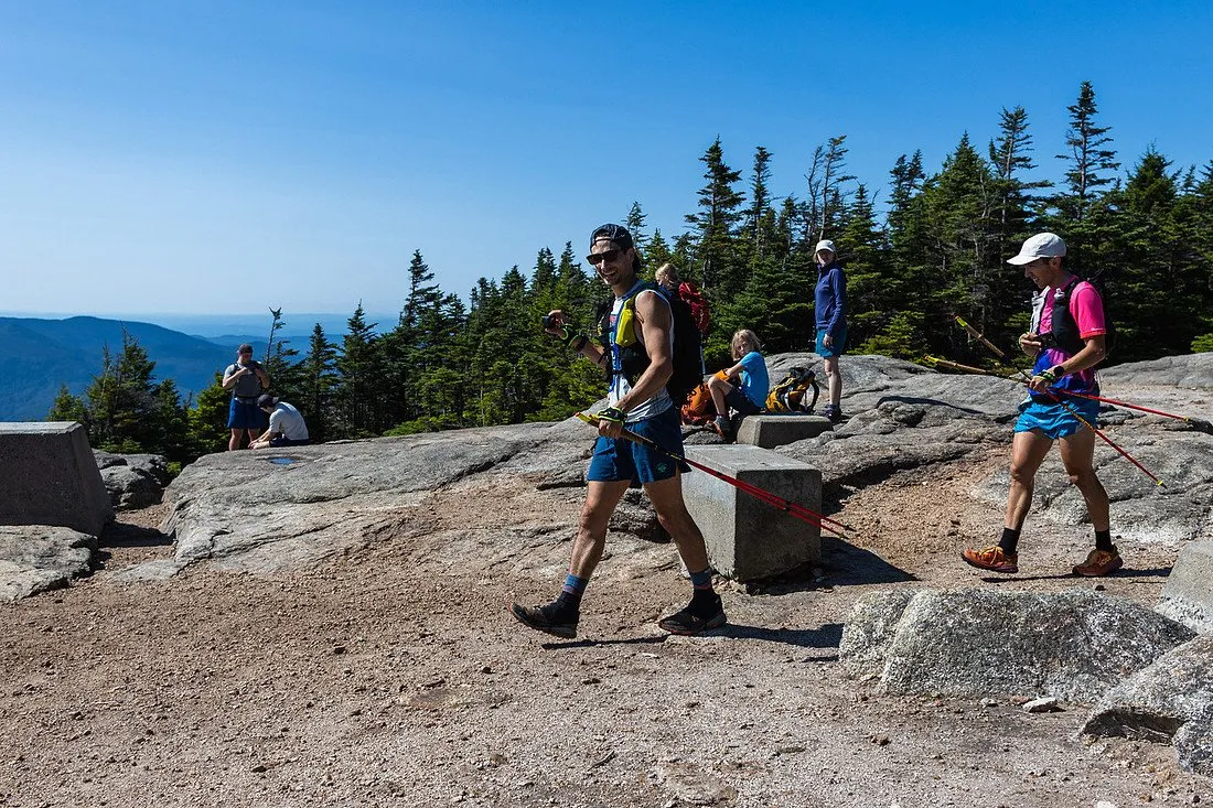 Runners crossing the summit ledges