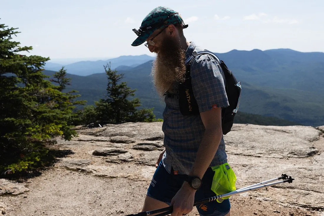A runner taking in the summit