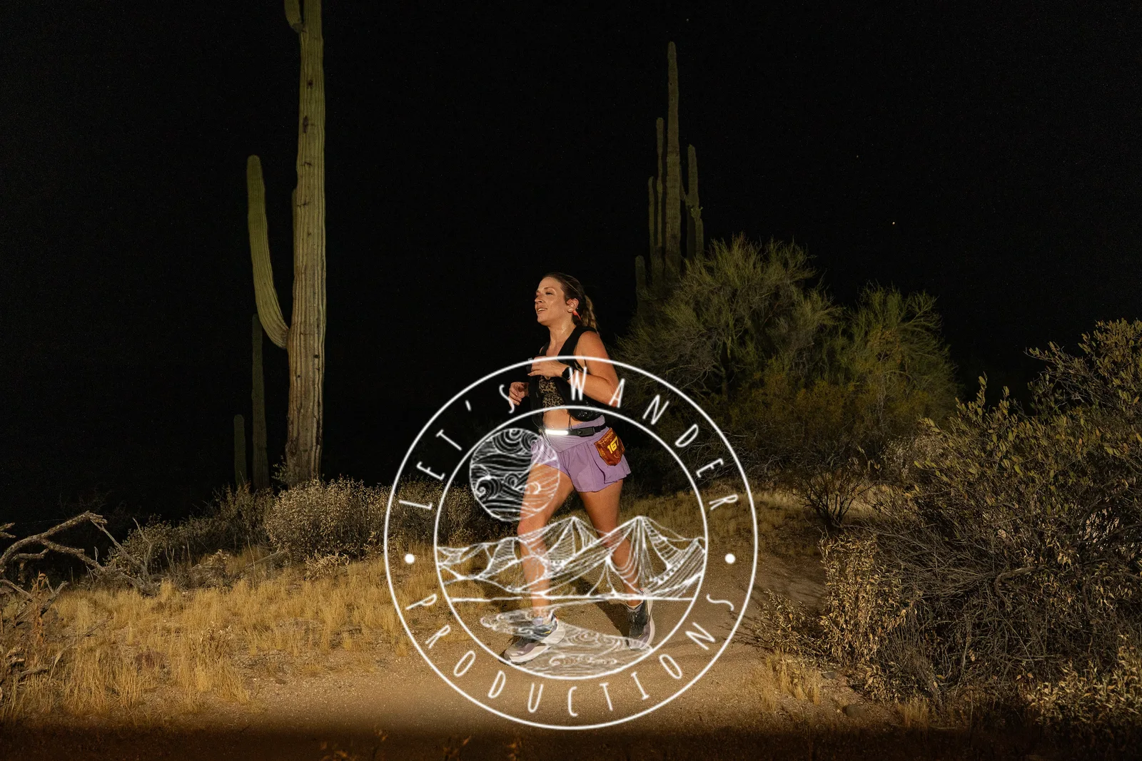 Runners by headlamp at the Adrenaline Night Runs in McDowell Mountain Regional Park