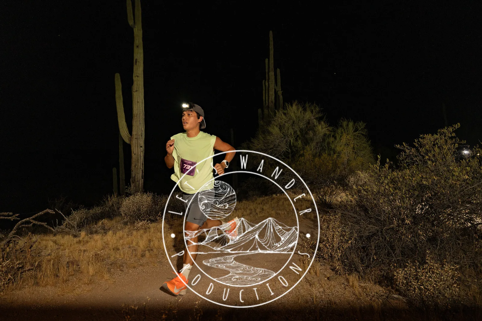 Runners by headlamp at the Adrenaline Night Runs in McDowell Mountain Regional Park