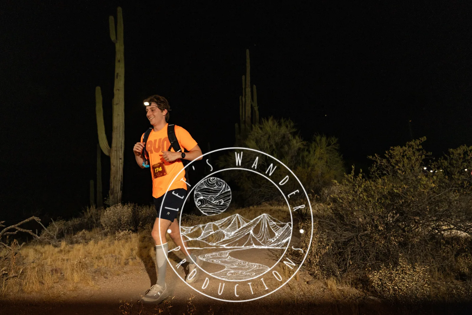 Runners by headlamp at the Adrenaline Night Runs in McDowell Mountain Regional Park