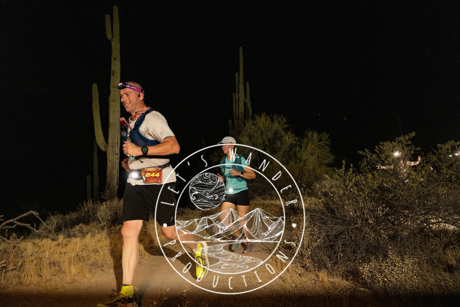 Runners by headlamp at the Adrenaline Night Runs in McDowell Mountain Regional Park