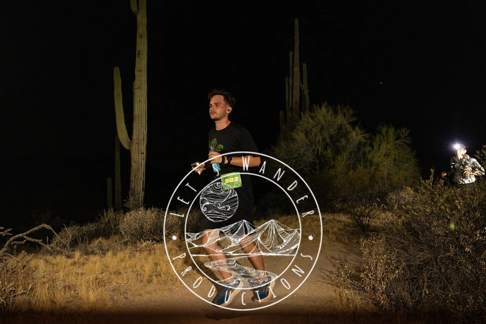 Runners by headlamp at the Adrenaline Night Runs in McDowell Mountain Regional Park