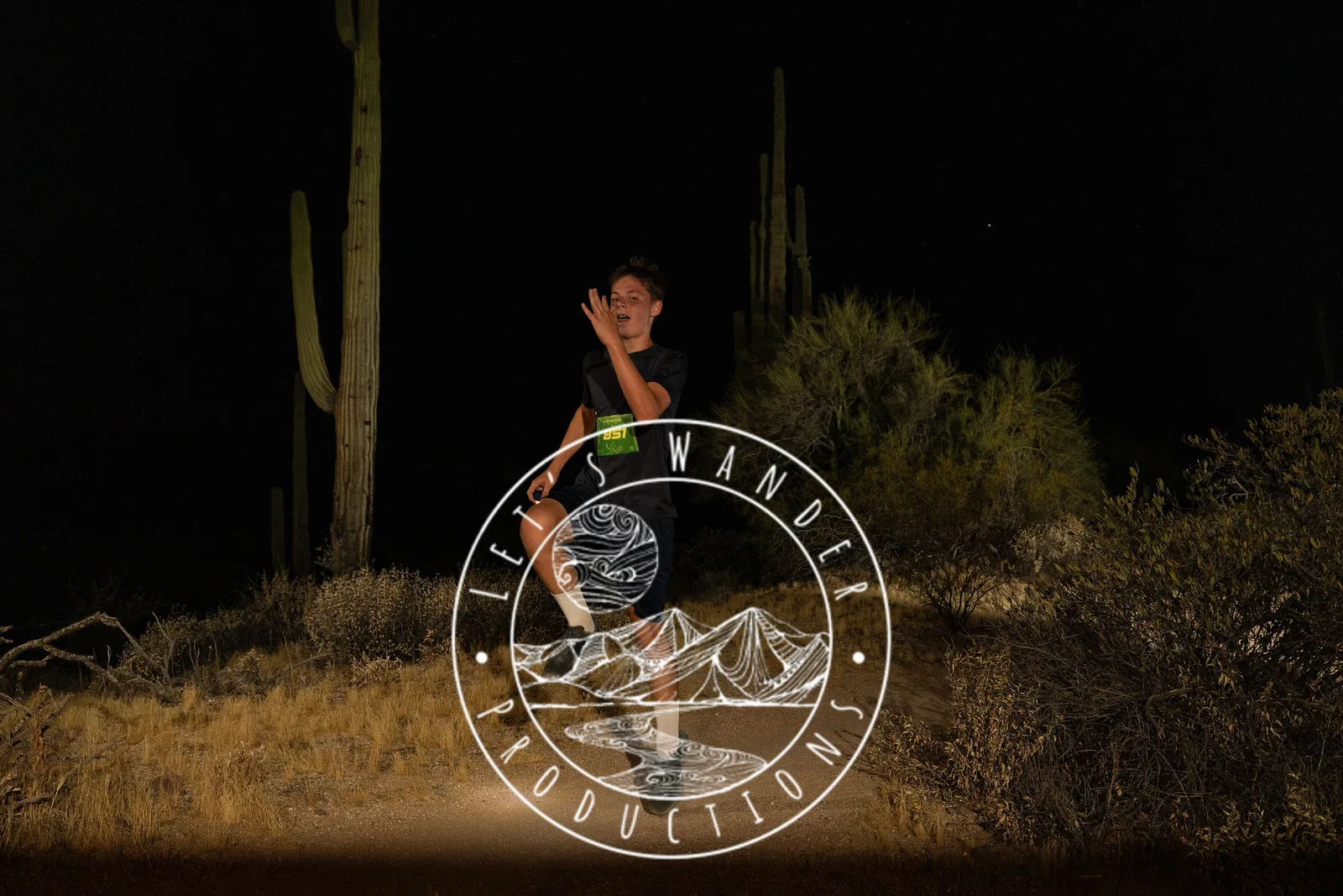 Runners by headlamp at the Adrenaline Night Runs in McDowell Mountain Regional Park