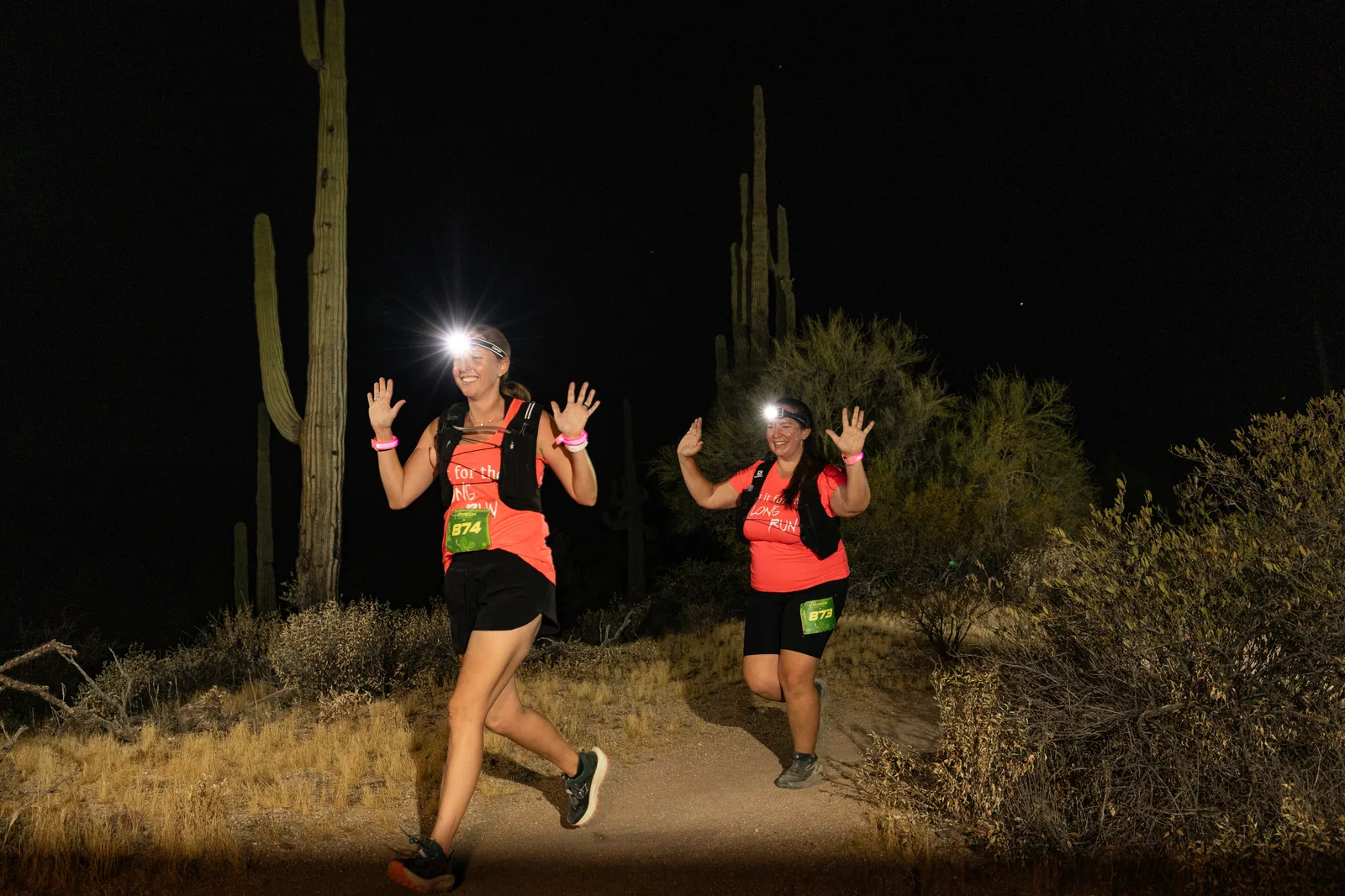 Runners by headlamp at the Adrenaline Night Runs in McDowell Mountain Regional Park
