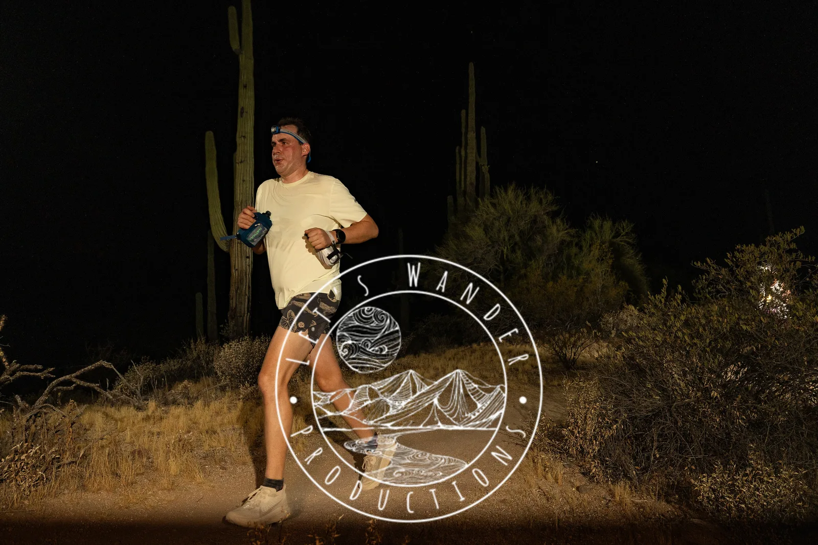 Runners by headlamp at the Adrenaline Night Runs in McDowell Mountain Regional Park