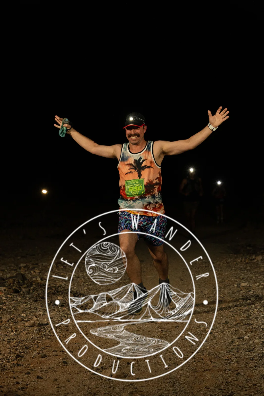 Runners by headlamp at the Hypnosis Night Runs at Estrella Mountain