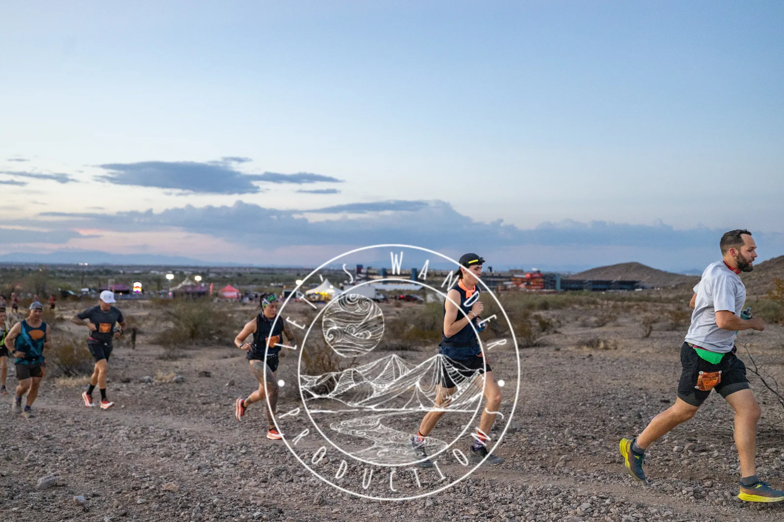 Runners by headlamp at the Hypnosis Night Runs at Estrella Mountain