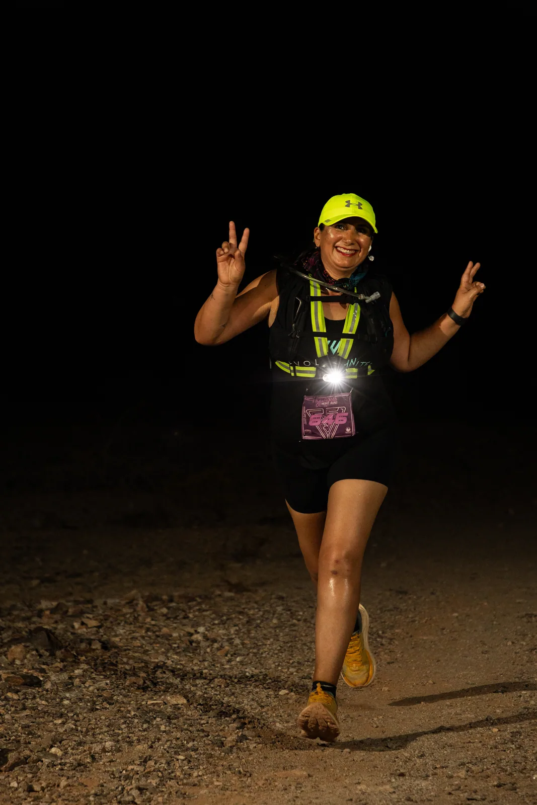 Runners by headlamp at the Hypnosis Night Runs at Estrella Mountain