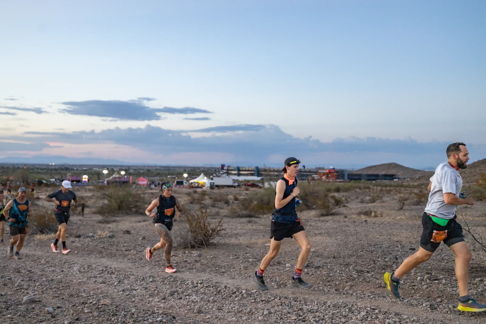 Runners by headlamp at the Hypnosis Night Runs at Estrella Mountain