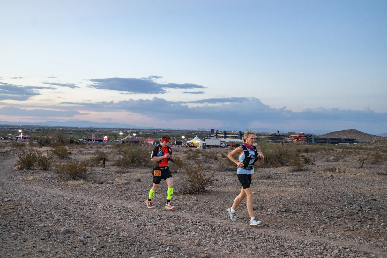 Runners by headlamp at the Hypnosis Night Runs at Estrella Mountain