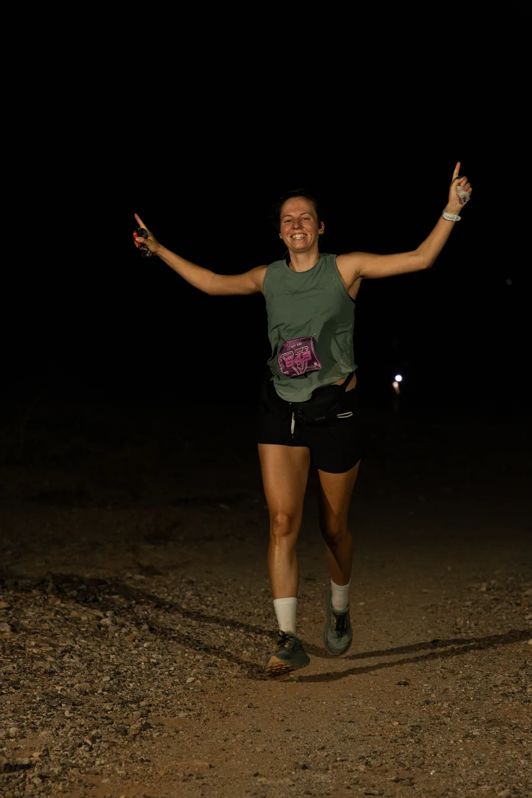 Runners by headlamp at the Hypnosis Night Runs at Estrella Mountain