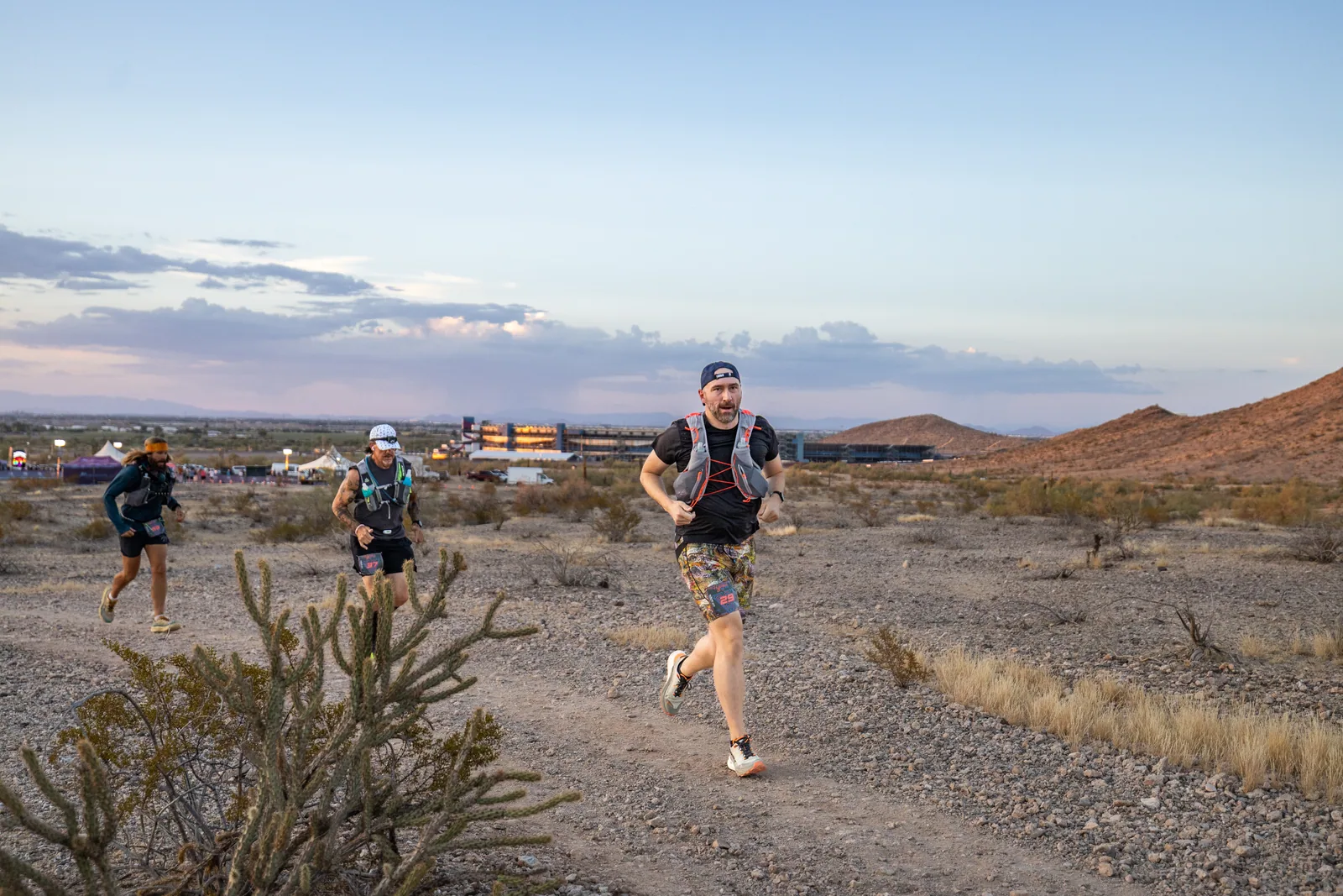 Runners by headlamp at the Hypnosis Night Runs at Estrella Mountain