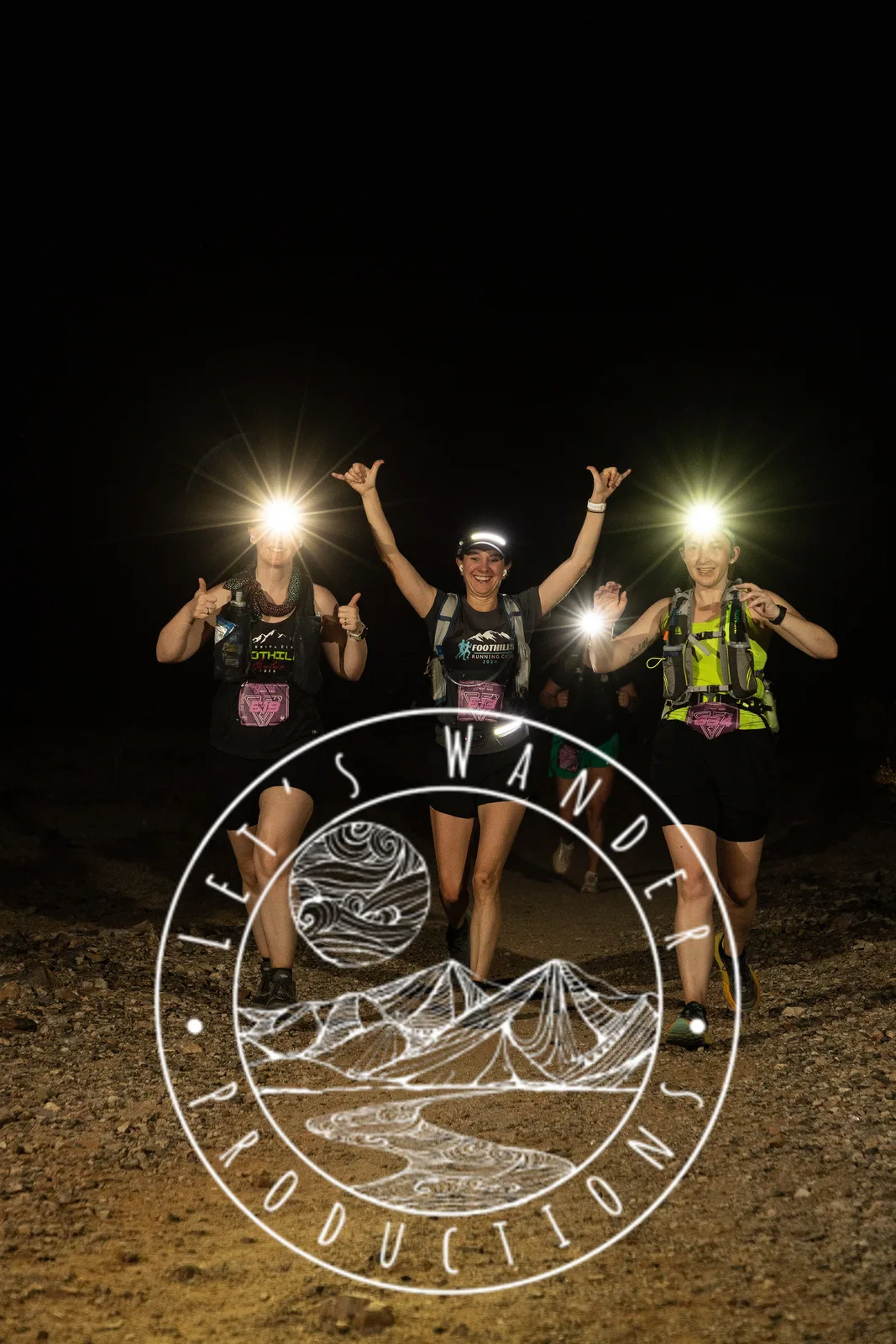 Runners by headlamp at the Hypnosis Night Runs at Estrella Mountain