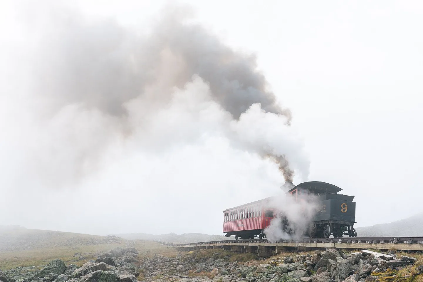 The Cog steam train climbing in the fog