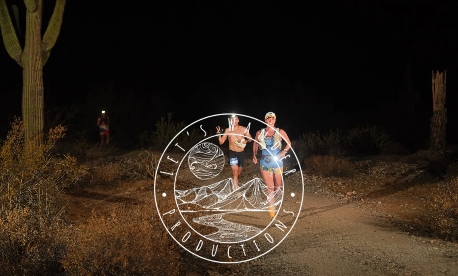 Runners by headlamp at the Vertigo Night Runs in White Tank Mountain Regional Park