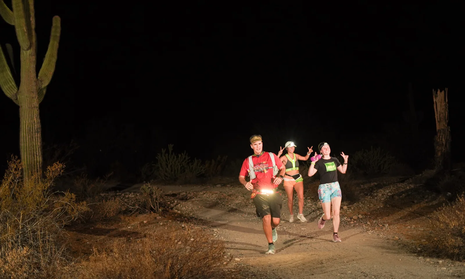 Runners by headlamp at the Vertigo Night Runs in White Tank Mountain Regional Park