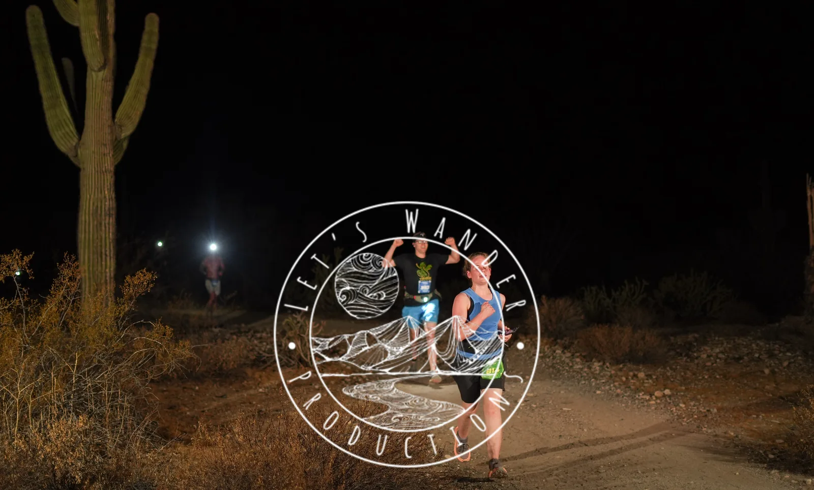 Runners by headlamp at the Vertigo Night Runs in White Tank Mountain Regional Park