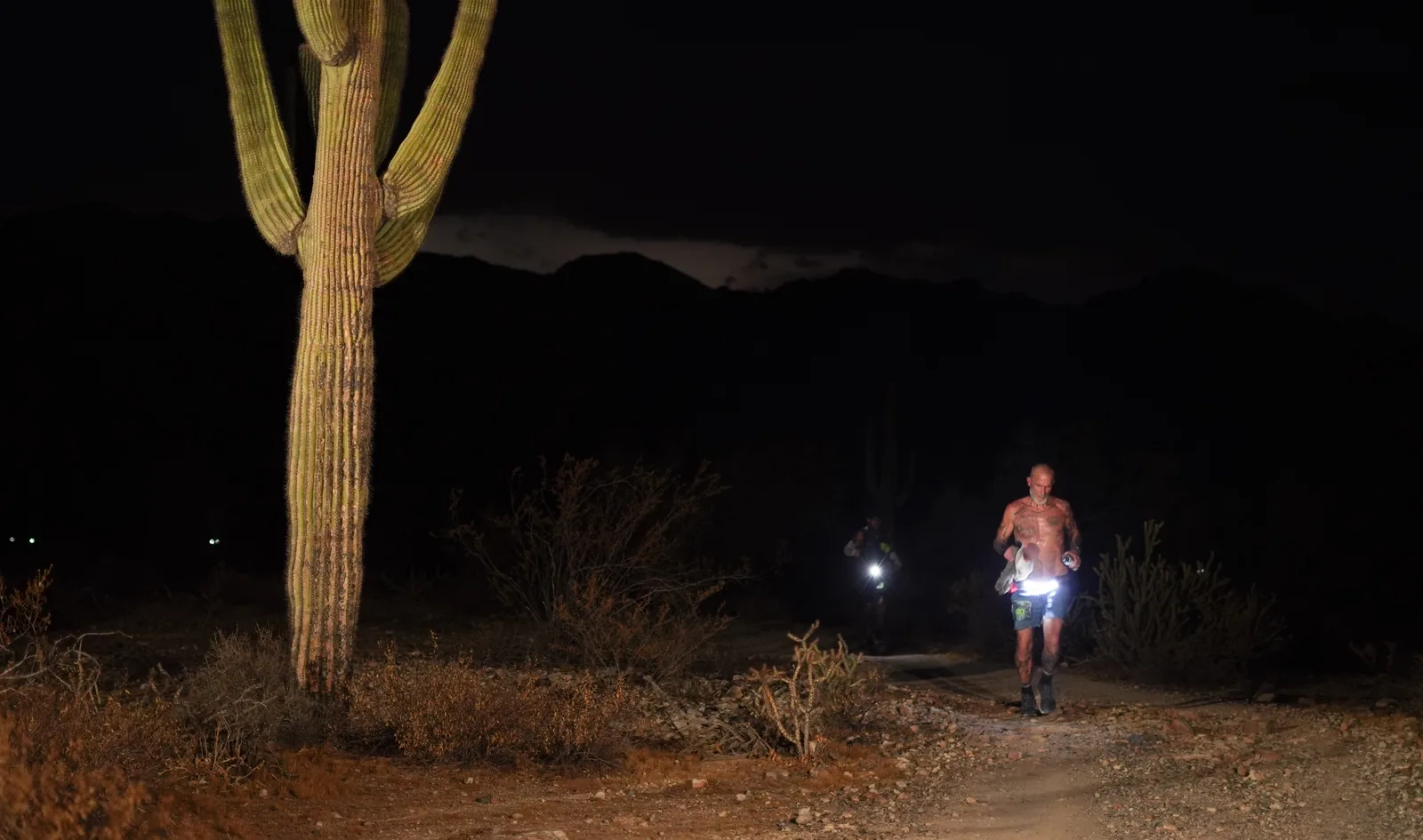 Runners by headlamp at the Vertigo Night Runs in White Tank Mountain Regional Park