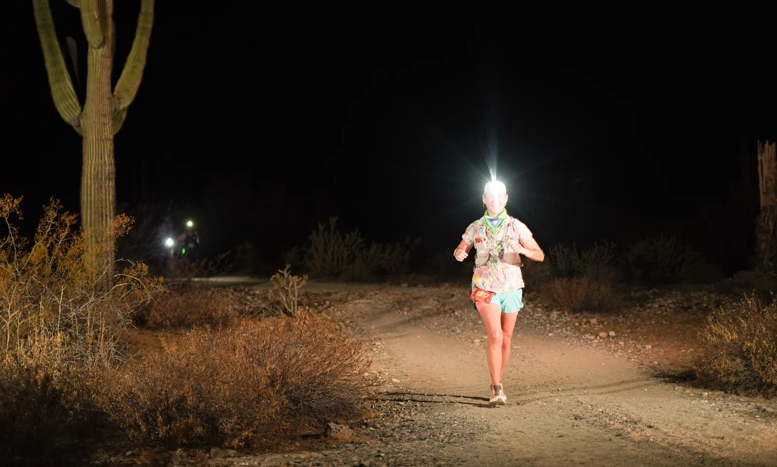 Runners by headlamp at the Vertigo Night Runs in White Tank Mountain Regional Park