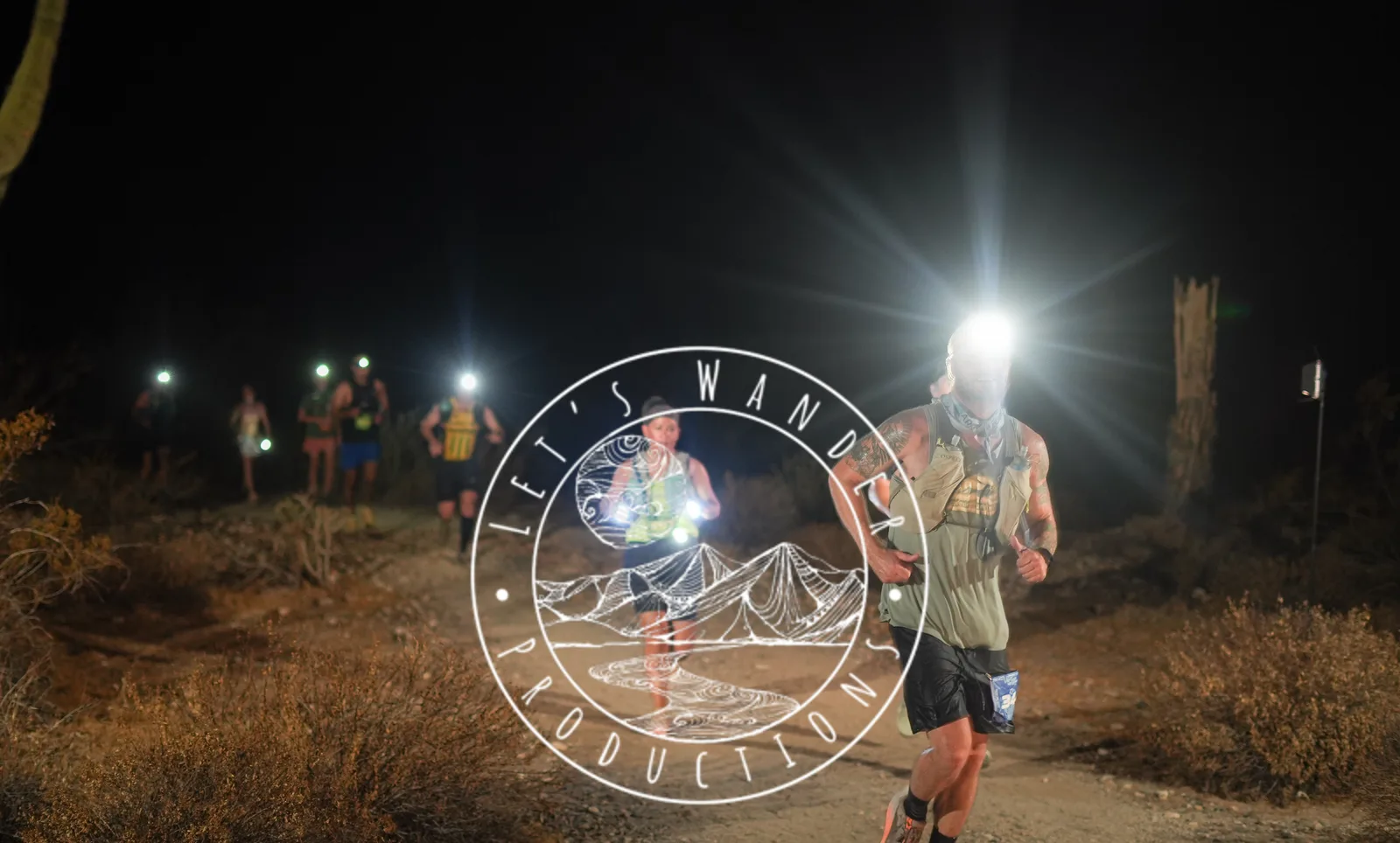 Runners by headlamp at the Vertigo Night Runs in White Tank Mountain Regional Park