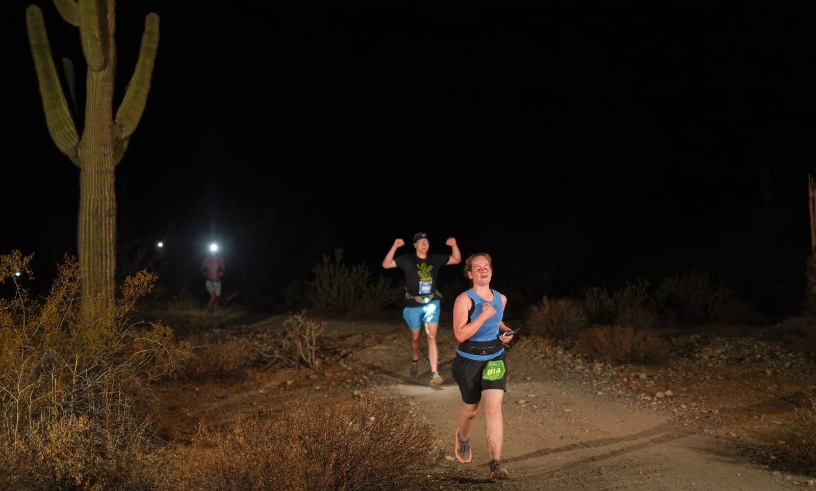 Runners by headlamp at the Vertigo Night Runs in White Tank Mountain Regional Park