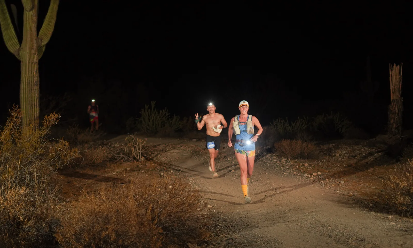 Runners by headlamp at the Vertigo Night Runs in White Tank Mountain Regional Park