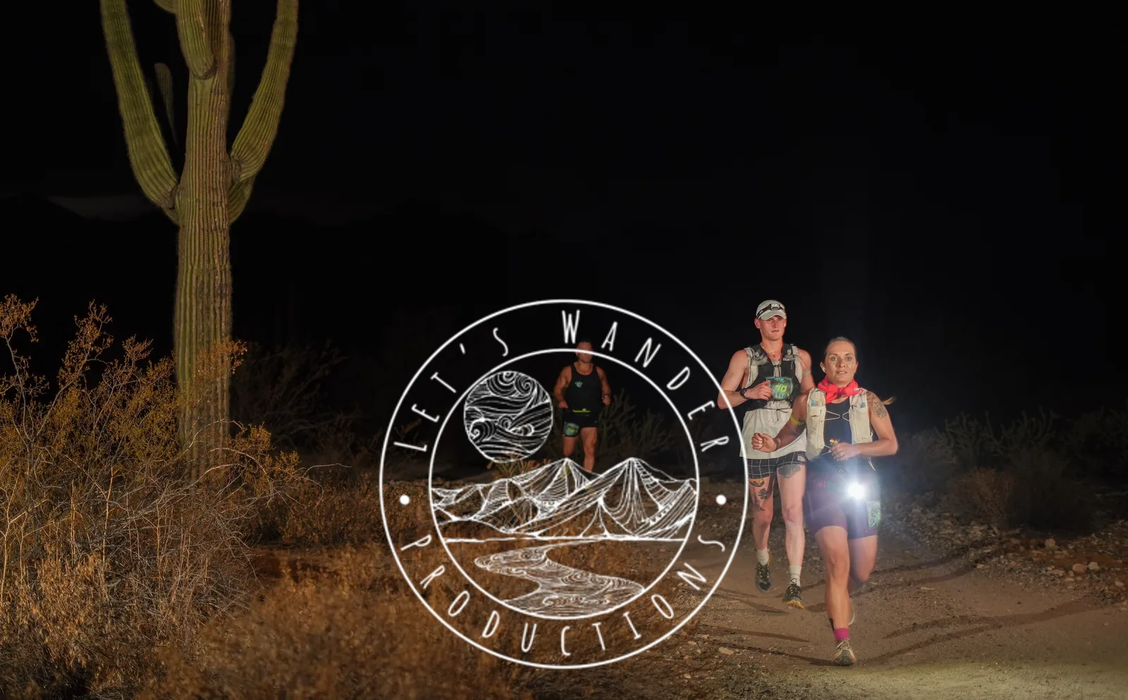 Runners by headlamp at the Vertigo Night Runs in White Tank Mountain Regional Park