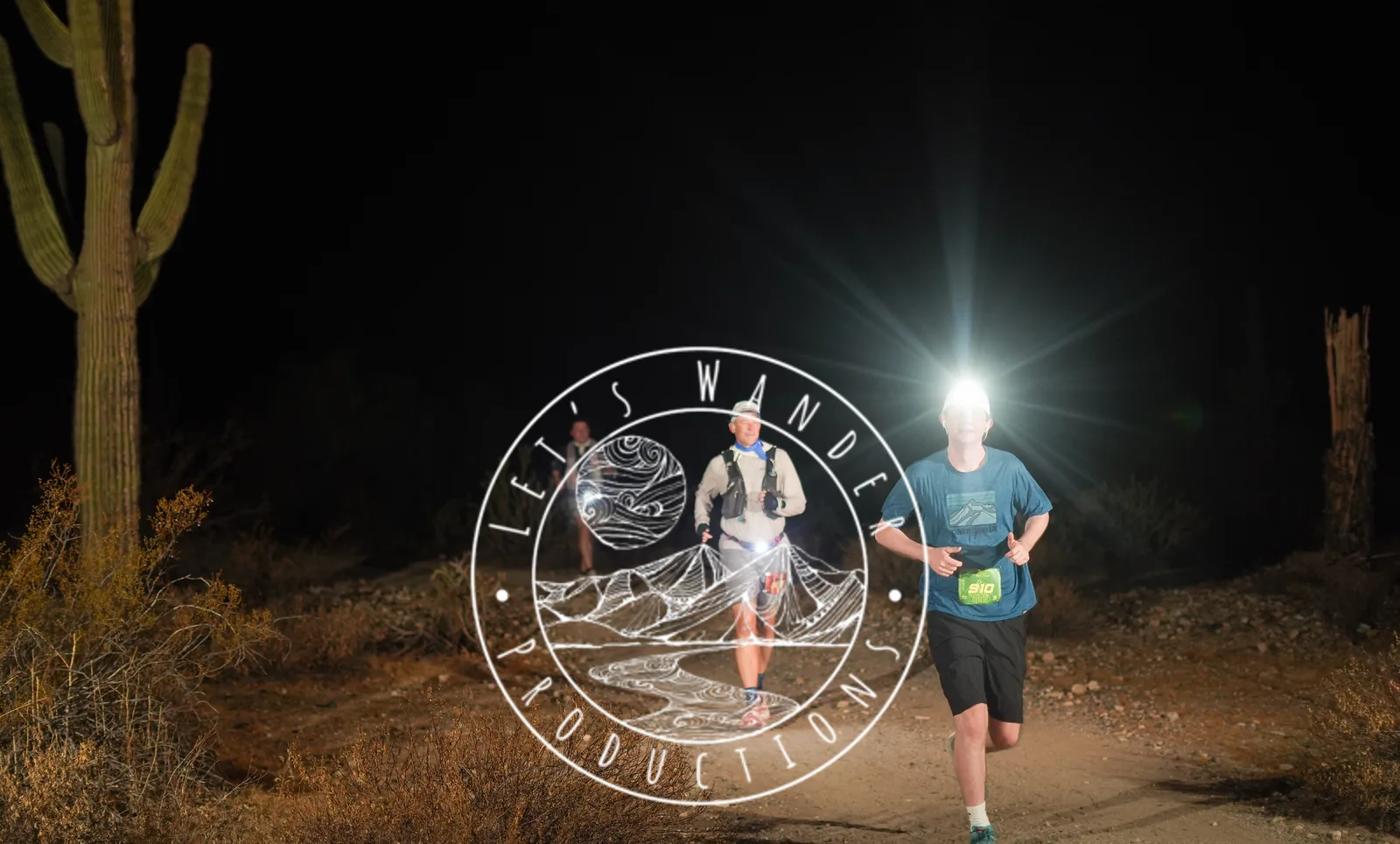 Runners by headlamp at the Vertigo Night Runs in White Tank Mountain Regional Park