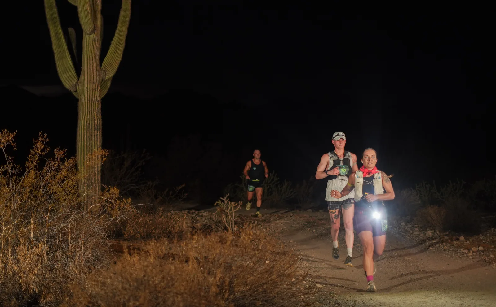 Runners by headlamp at the Vertigo Night Runs in White Tank Mountain Regional Park