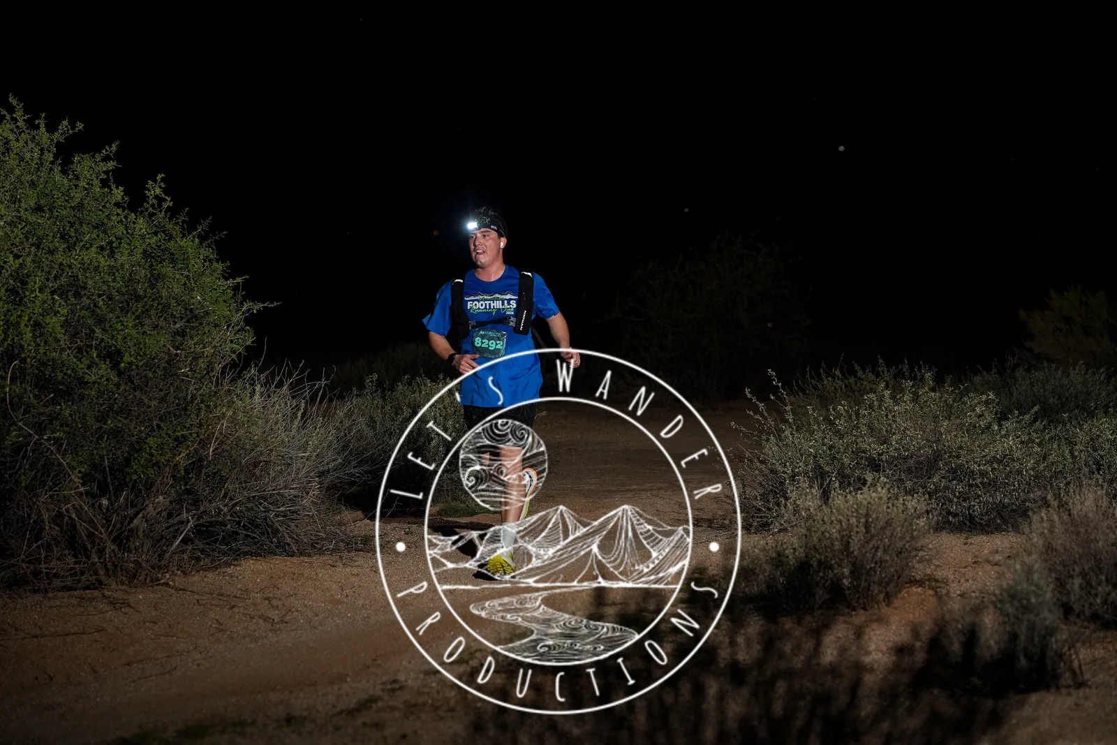 Runners at dusk and by headlamp at the Javelina Jangover Night Runs in McDowell Mountain Regional Park