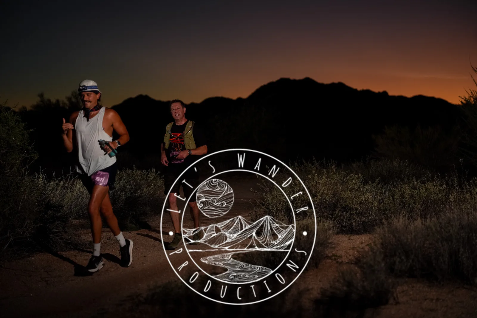 Runners at dusk and by headlamp at the Javelina Jangover Night Runs in McDowell Mountain Regional Park