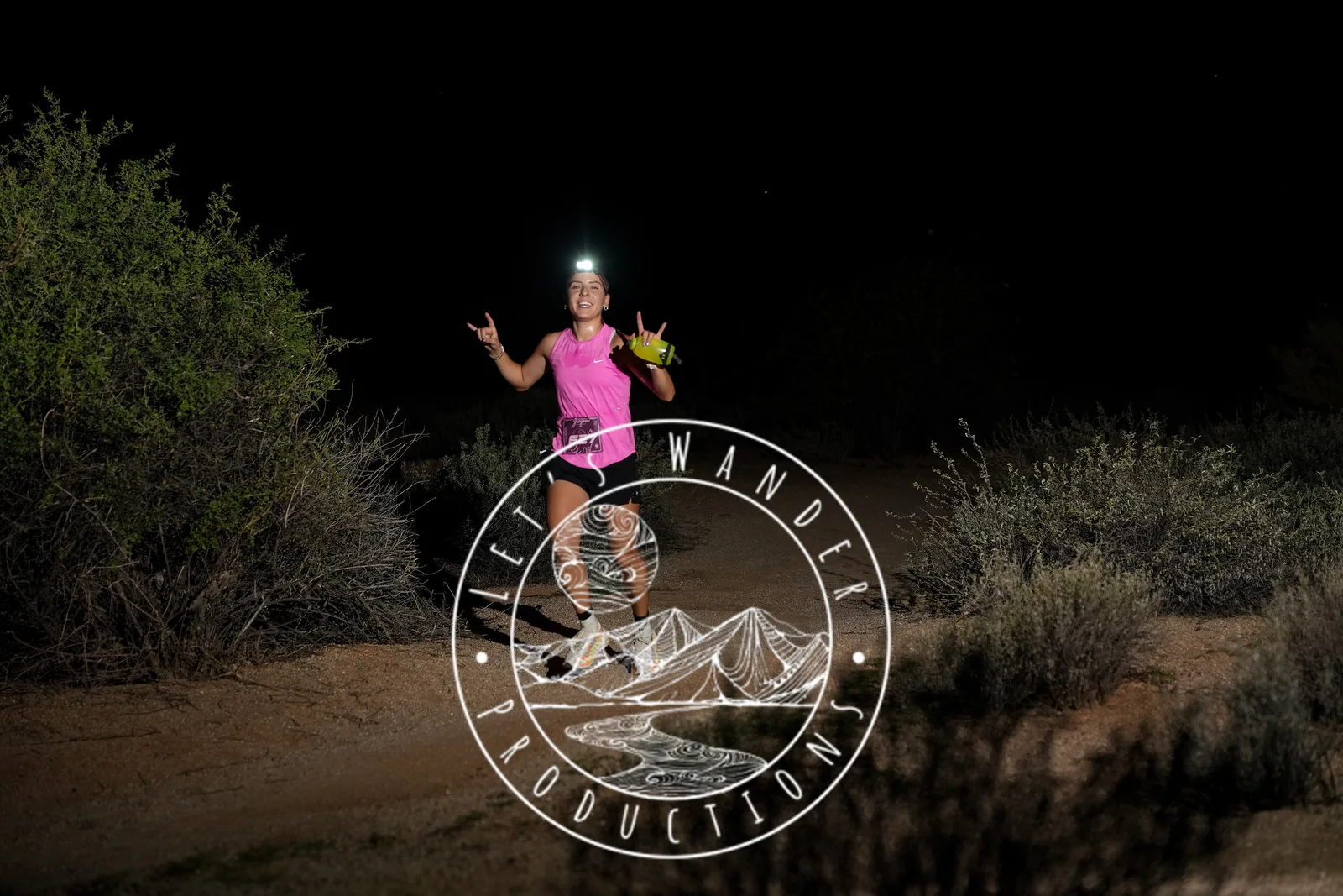Runners at dusk and by headlamp at the Javelina Jangover Night Runs in McDowell Mountain Regional Park