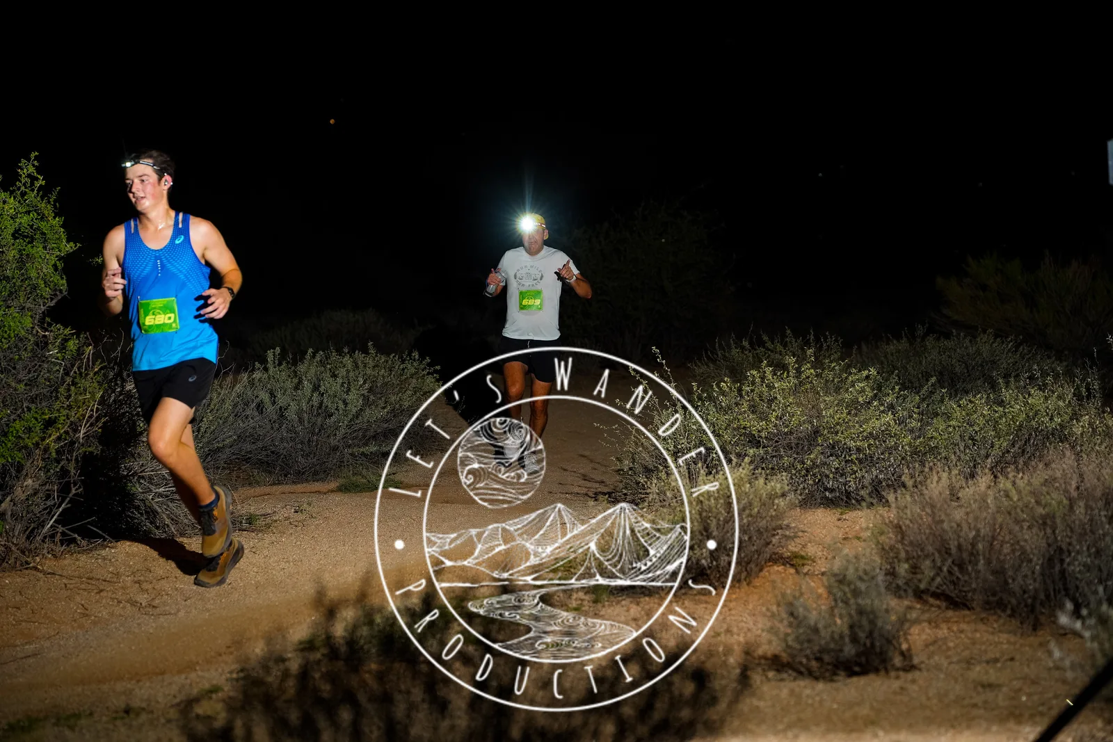 Runners at dusk and by headlamp at the Javelina Jangover Night Runs in McDowell Mountain Regional Park