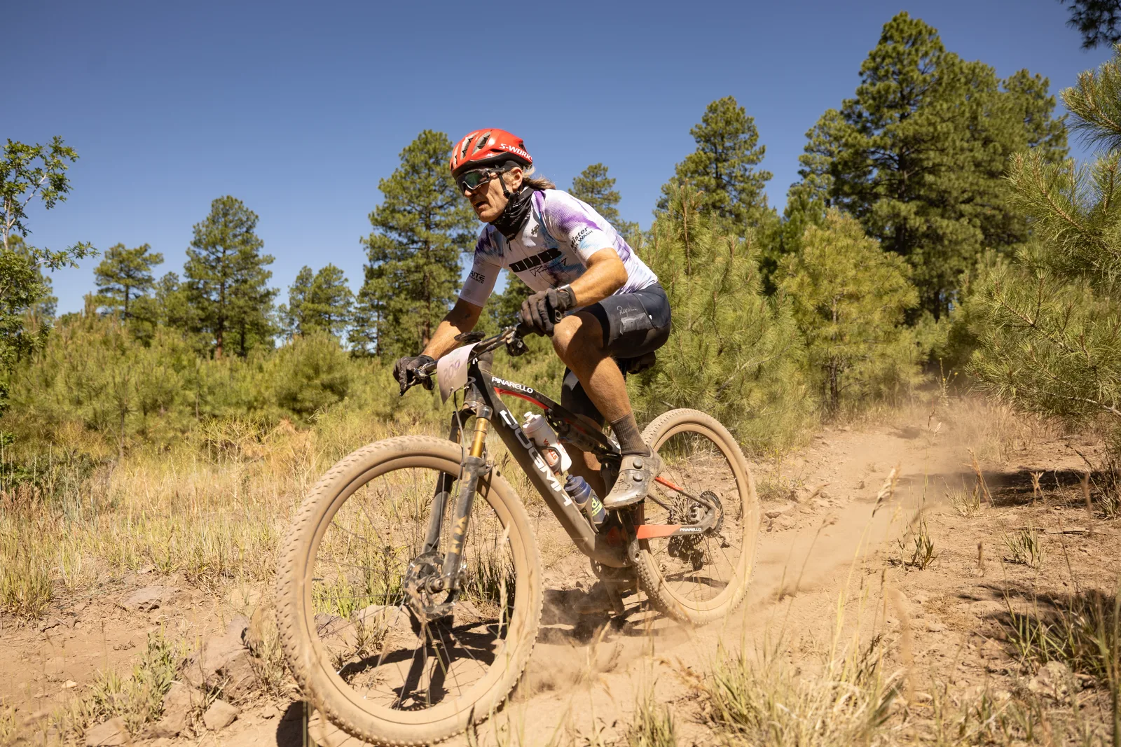 Rider on the Big Woody Rides loop in the pines near Flagstaff