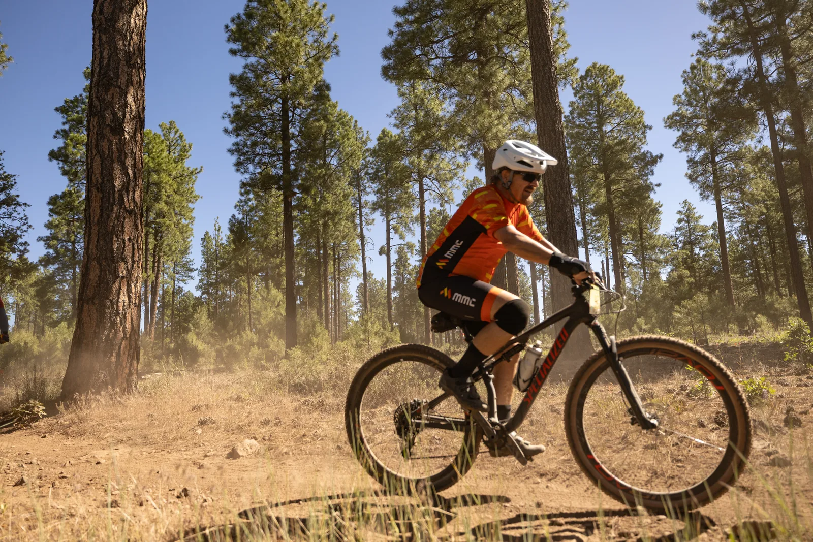 Rider on the Big Woody Rides loop in the pines near Flagstaff