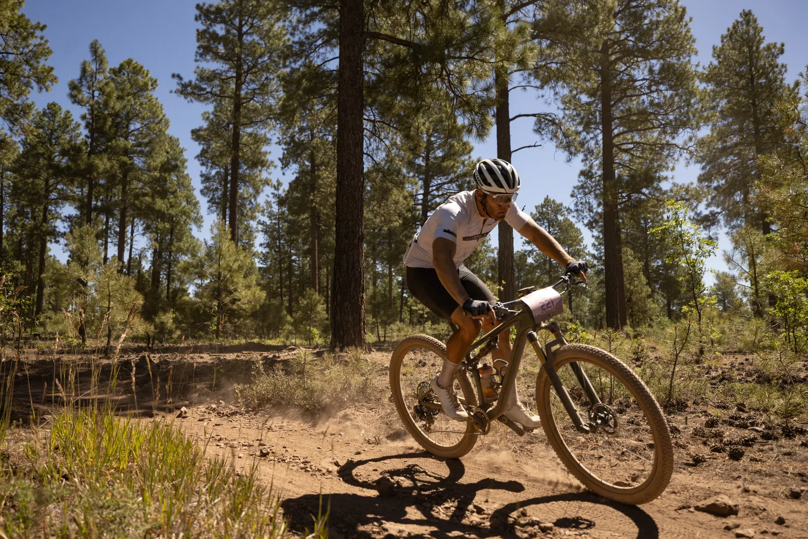 Rider on the Big Woody Rides loop in the pines near Flagstaff