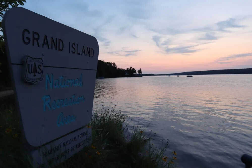 Grand Island National Recreation Area sign at dusk