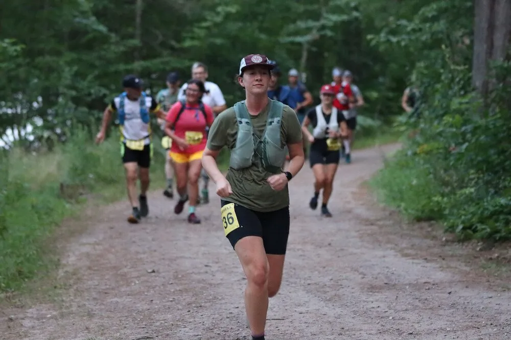 Runners on a forest two-track