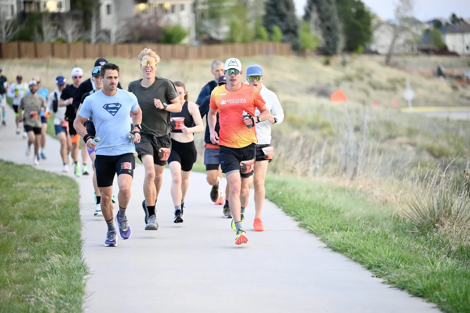 A pack of runners on the trail early in the race