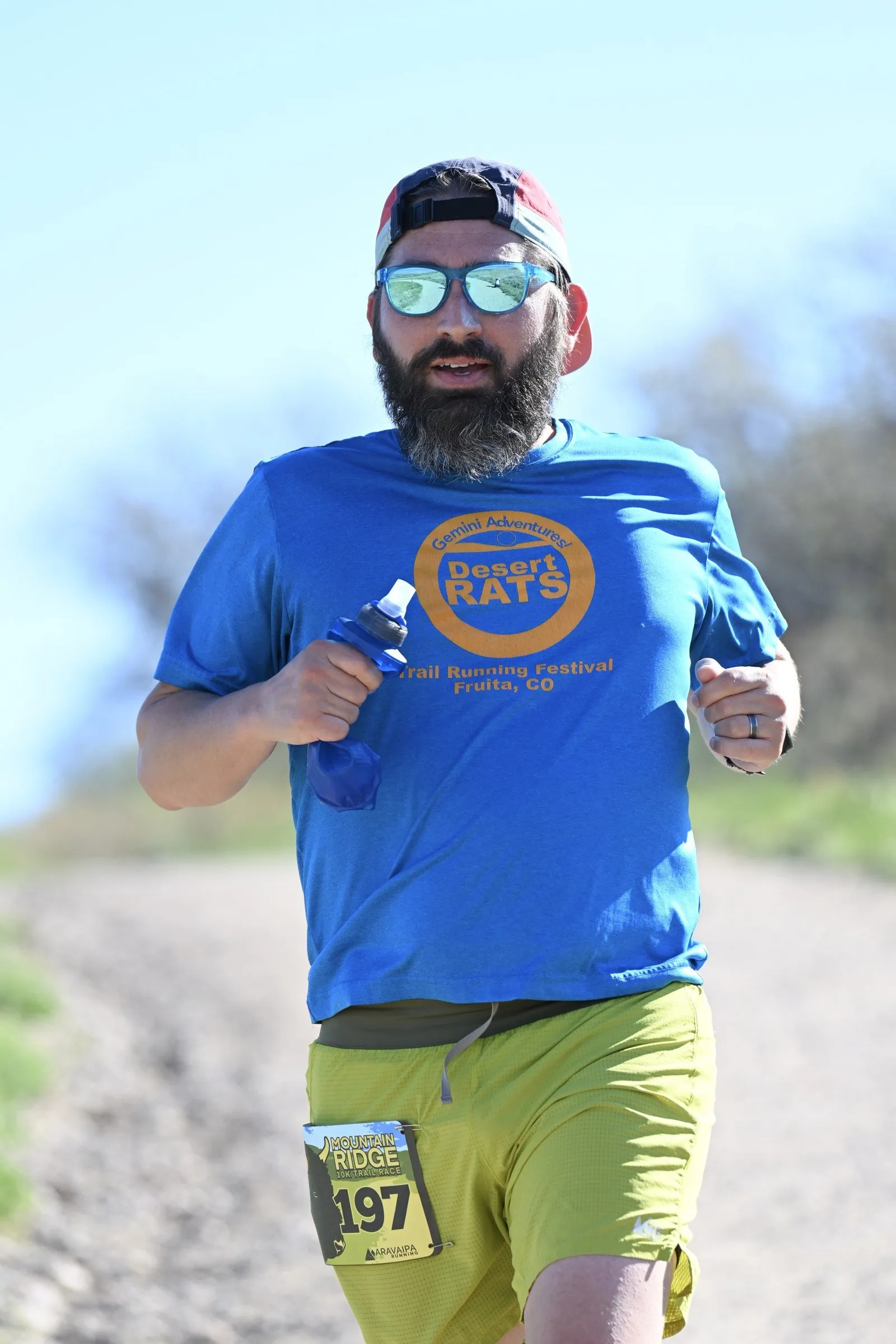 A runner grinning at the camera
