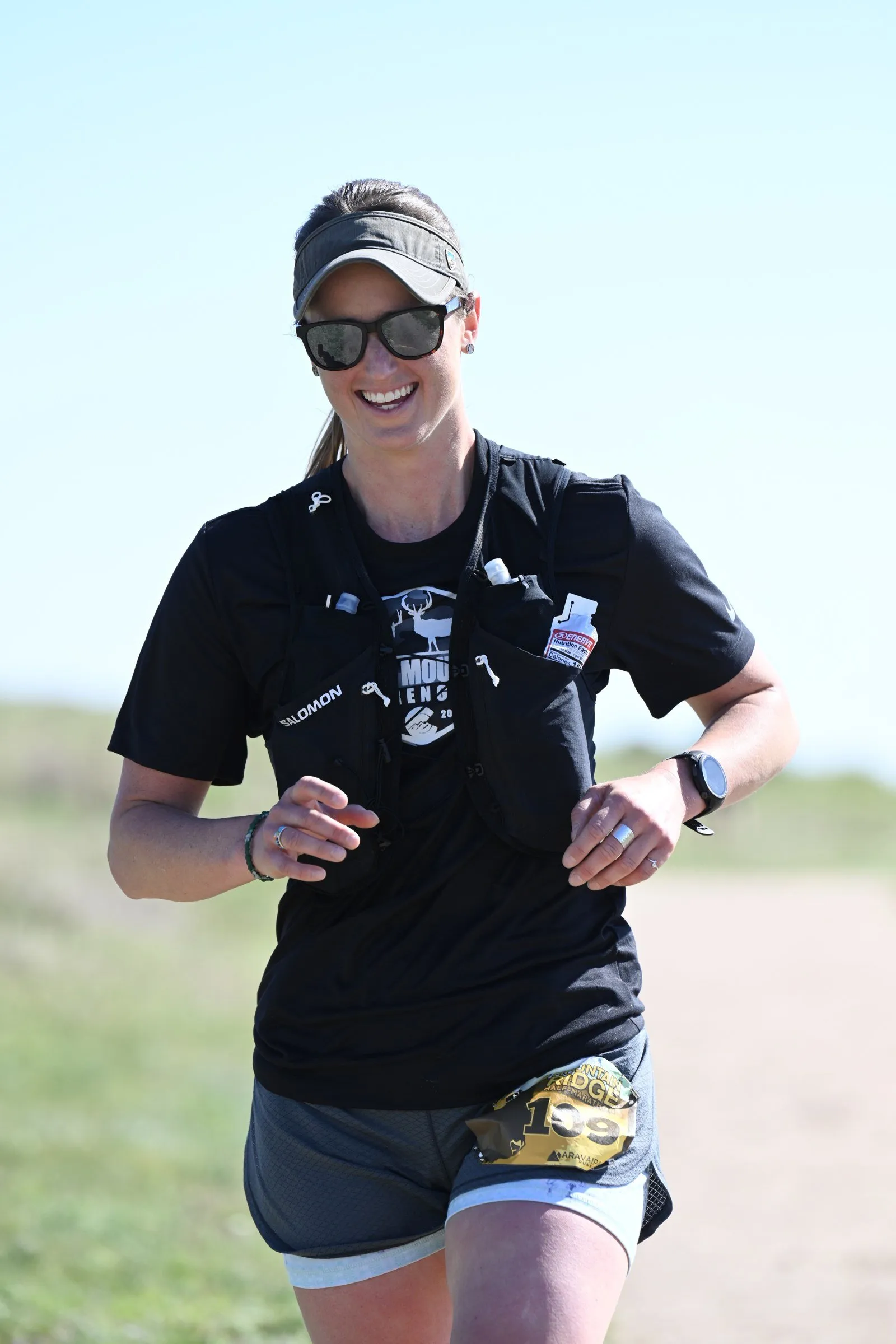 A runner smiling on the course