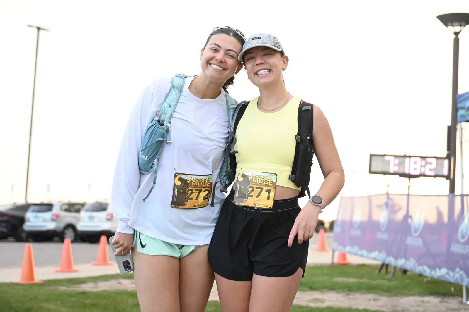Two friends with their bibs before the race