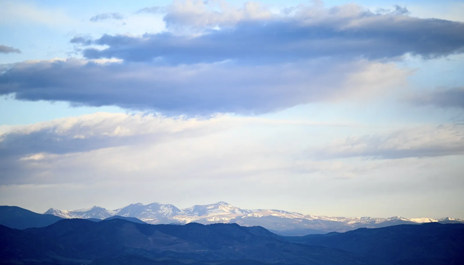 The Front Range peaks above the course