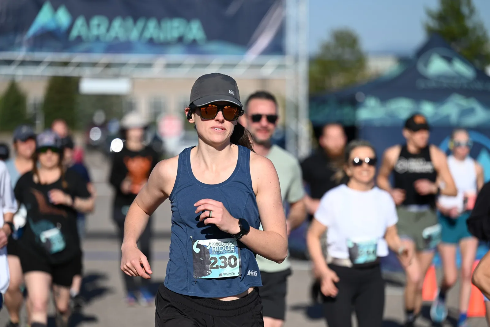 Runners smiling through the start