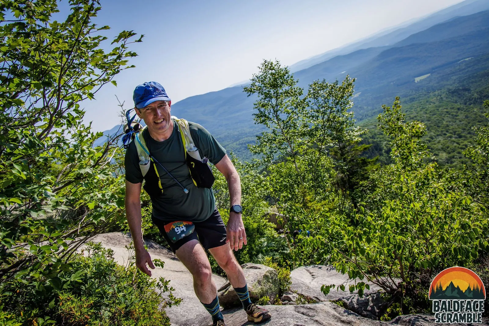 Runner climbing out of the trees onto the ledges